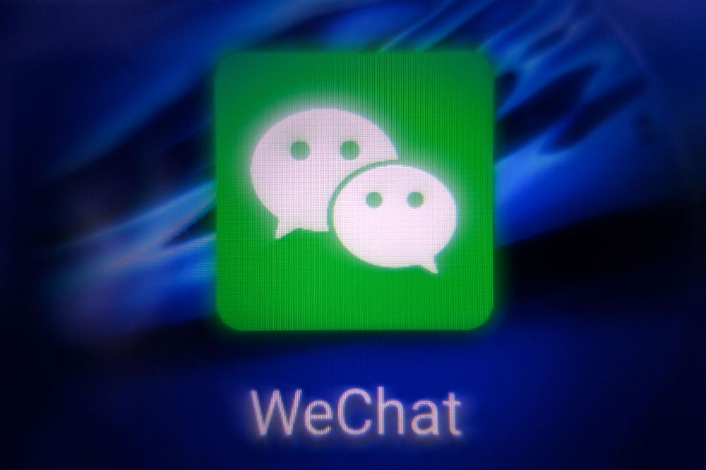 中國媒體指出,微信的商業模式恐難在美國市場推行。法新社