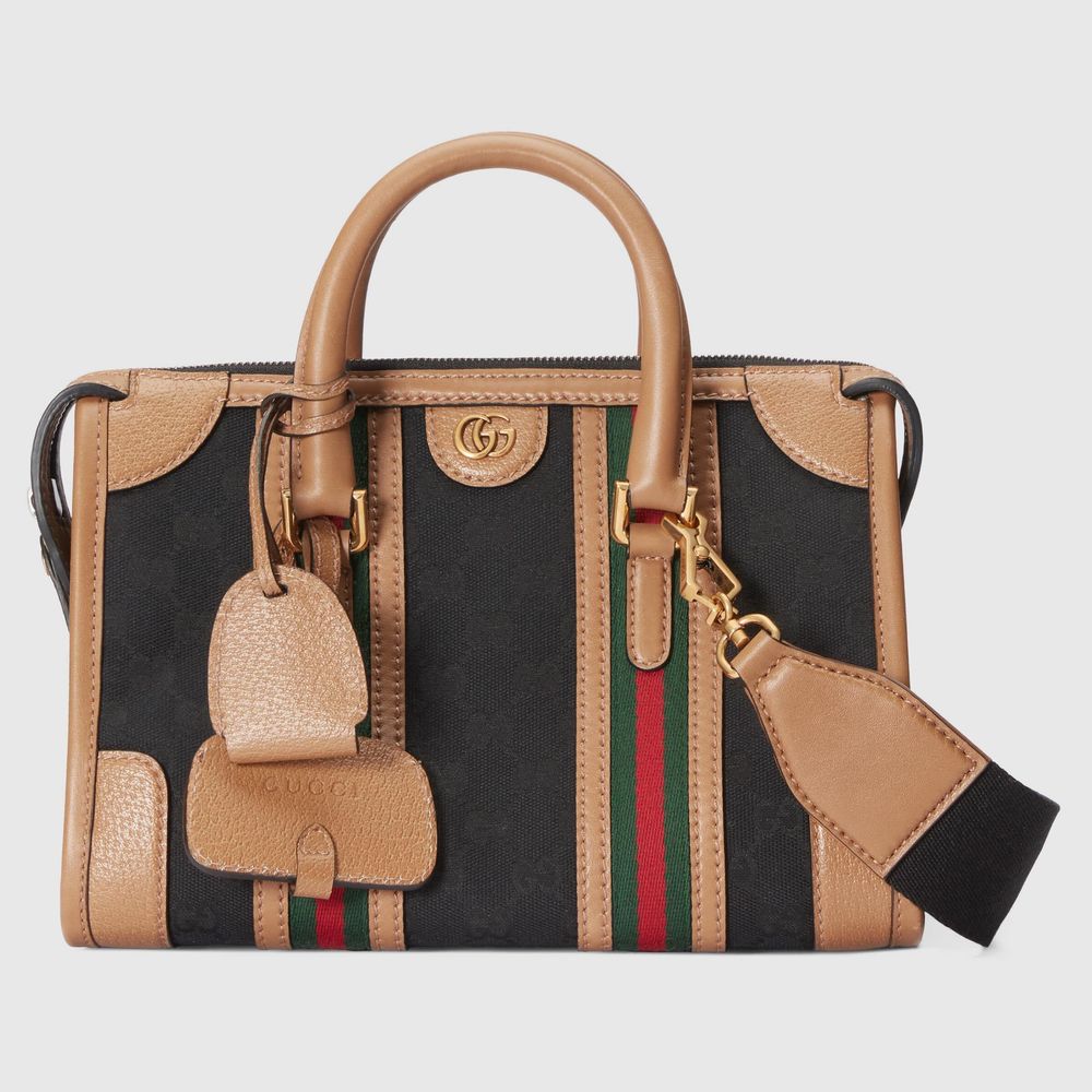 Exquisite GUCCI系列全新推出的雙G黑棕色小型肩背提包,9萬500元。品牌提供