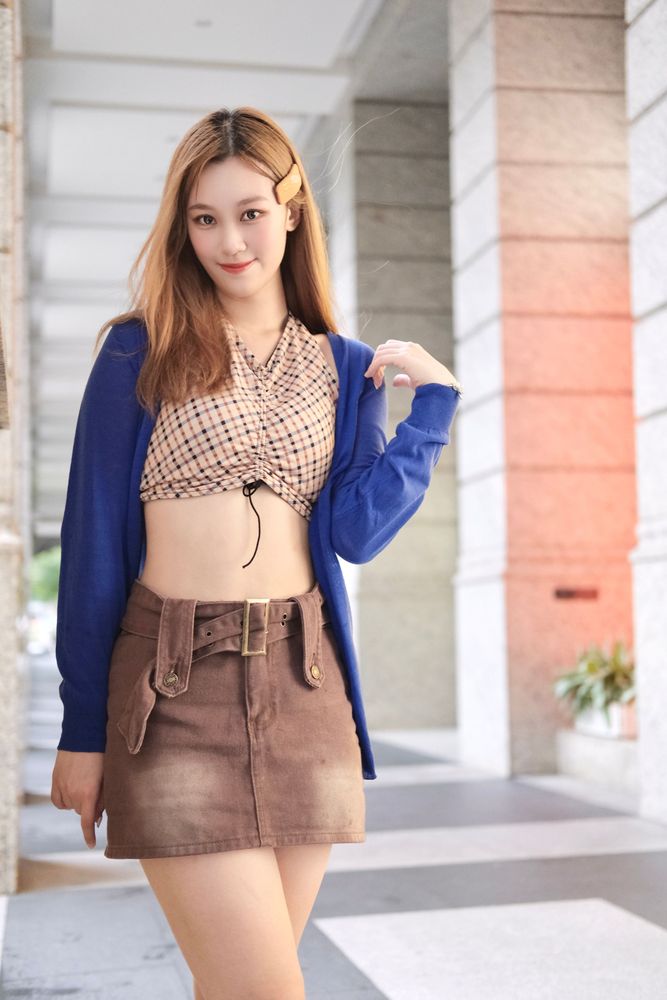 20歲的羅優暱稱「果汁女孩」,有著甜甜的笑容。陳志淵攝