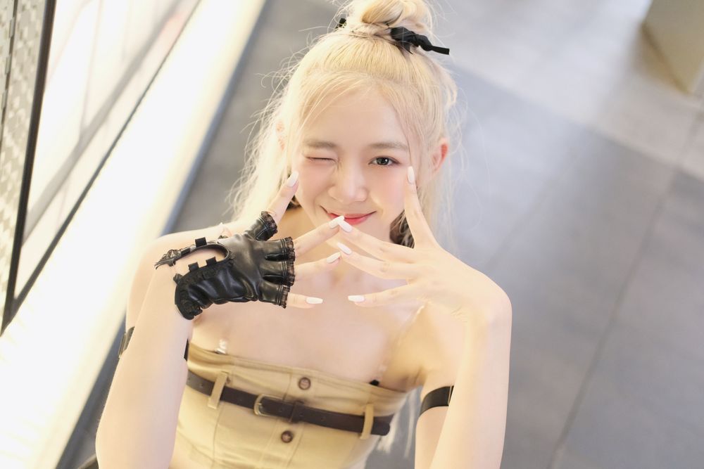 Bixiu一头金色秀发，活泼大方。陈志渊摄