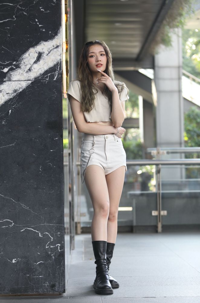 爱跳舞的欣谕有双修长的长腿。陈明中摄