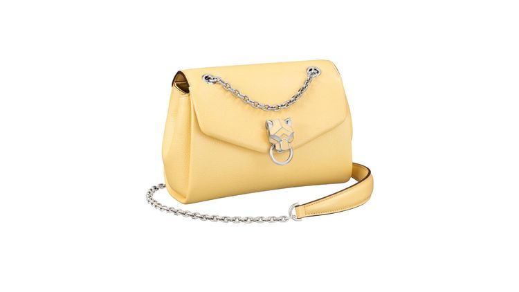 Panthère de Cartier淺黃色美洲豹迷你款鍊帶包，約9萬500元。品牌提供