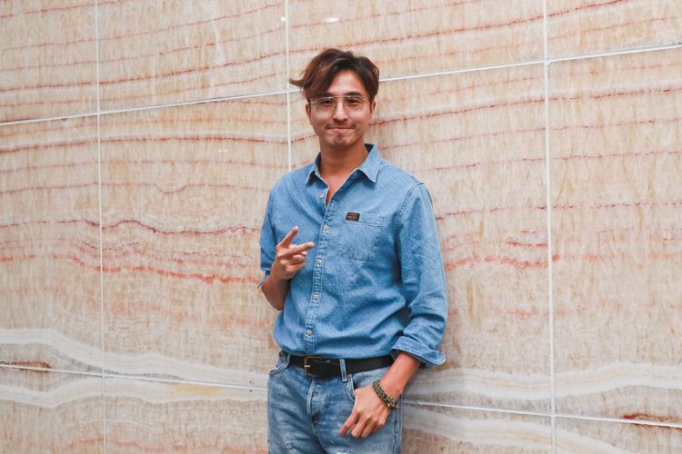 王少偉熱愛看房地產報導。趙世平攝