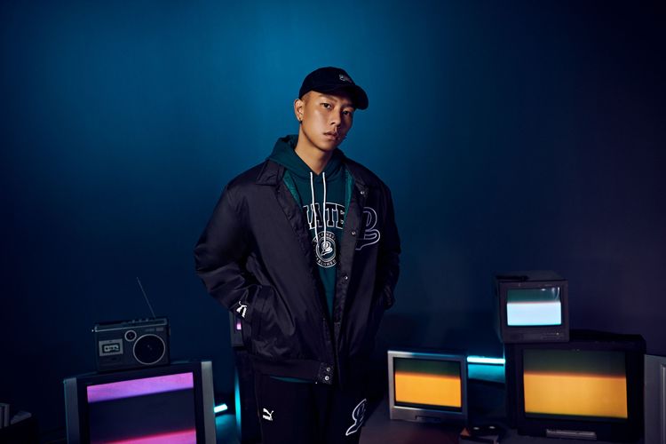 PUMA Team秋冬黑色棒球外套以綠色內裡展現悶騷設計感。品牌提供