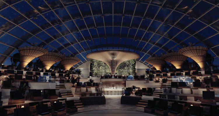 夜晚慵懶海灘氛圍的玻璃穹頂空中花園。公主遊輪提供