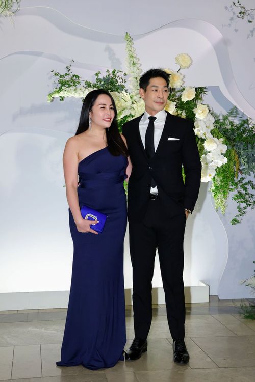 藍鈞天(右)與妻出席婚宴。趙世平攝