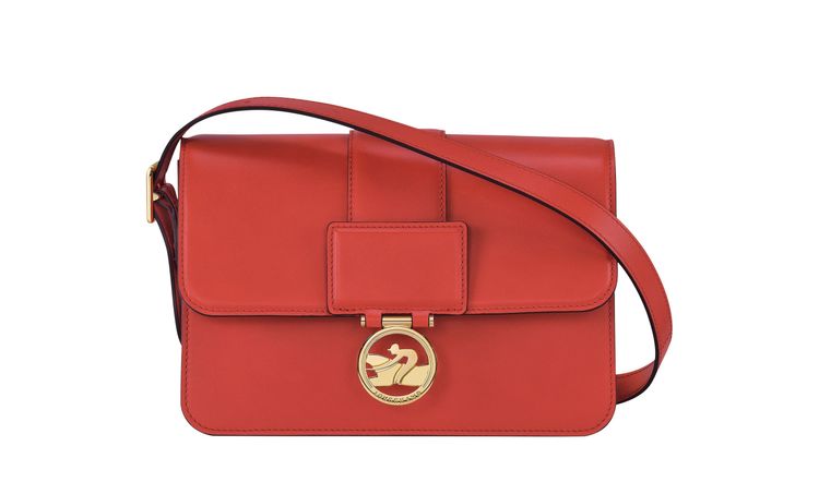 Box-Trot橘色肩背包中型款，2萬5000元。品牌提供