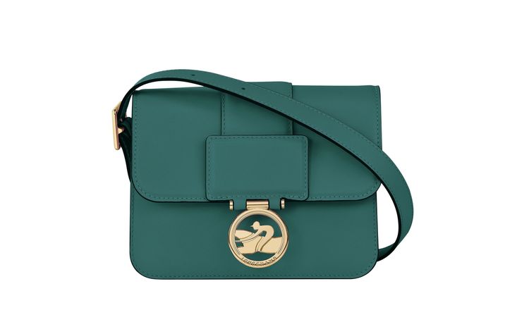 Box-Trot青綠色肩背包小型款，2萬600元。品牌提供