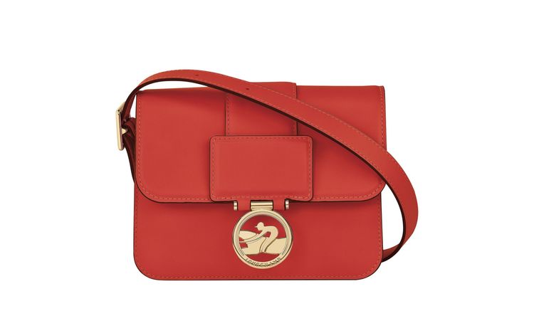 Box-Trot橘色肩背包小型款，2萬600元。品牌提供