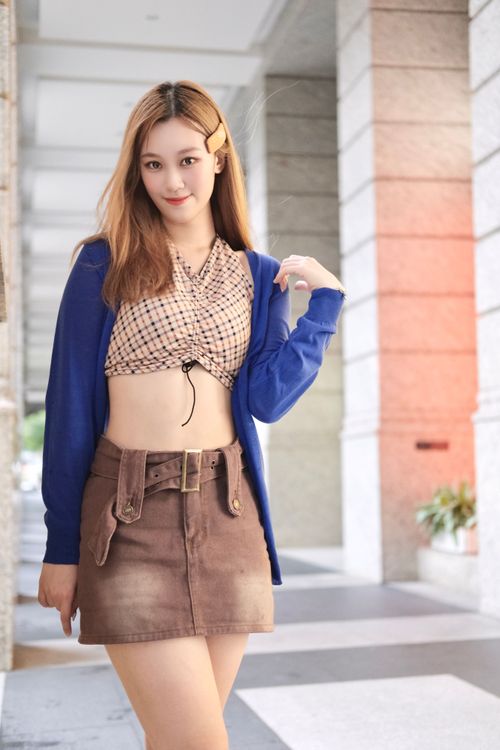 20歲的羅優暱稱「果汁女孩」，有著甜甜的笑容。陳志淵攝