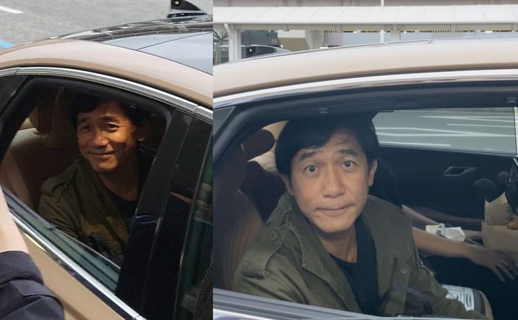 梁朝偉坐上車準備離開金海機場，特地搖下車窗與粉絲打招呼，讓韓粉非常感動。翻攝推特