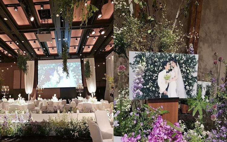 南宮珉、秦雅凜今晚在新羅飯店舉行婚禮，現場布滿花海，婚紗照曝光。翻攝推特