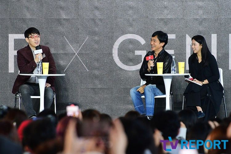 梁朝偉（中）轉身盯著影評人李東辰看，讓他害羞到不敢直視。翻攝TV REPORT